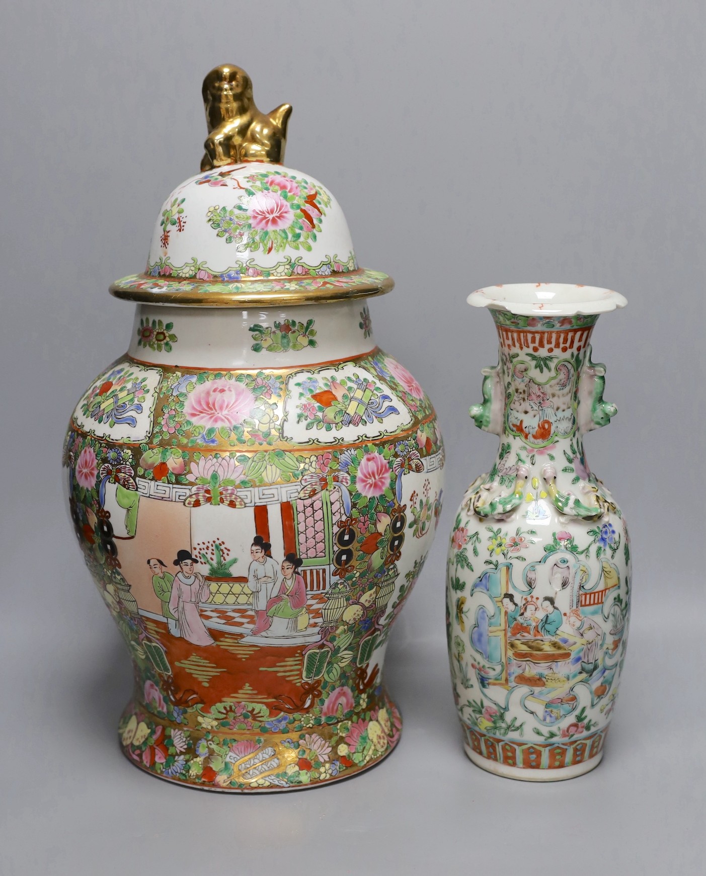 A 19th century Chinese famille rose vase and a later jar and cover, 19th century vase 30 cms high